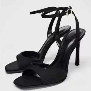 TRZA Spring new women's shoes, black ankle strap, straight strap, sexy hollow slim high-heeled temperament, plus size sandals